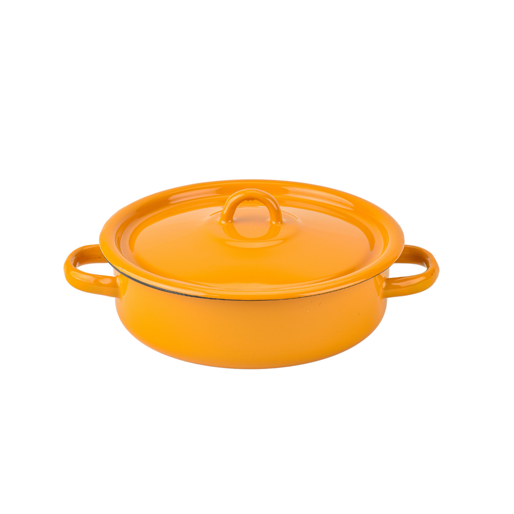 Orange enameled cast iron casserole dish with lid on a white background
