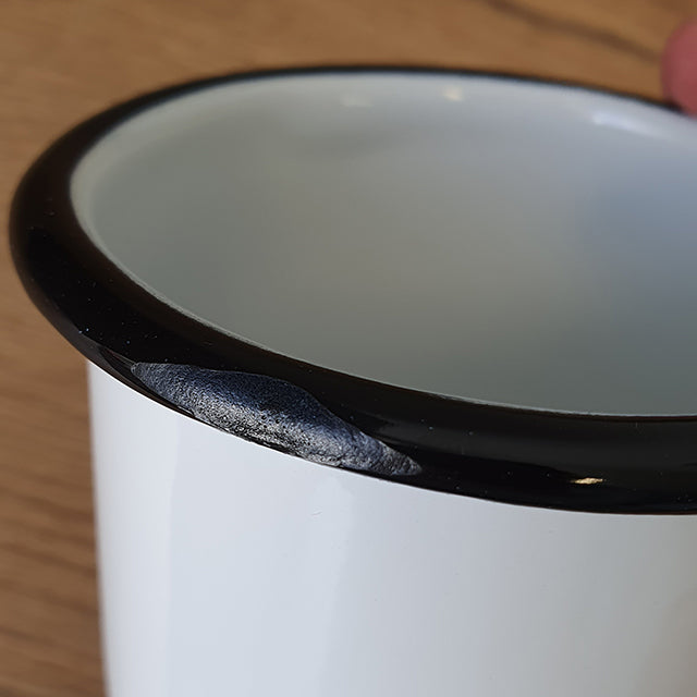 damaged enamel mug