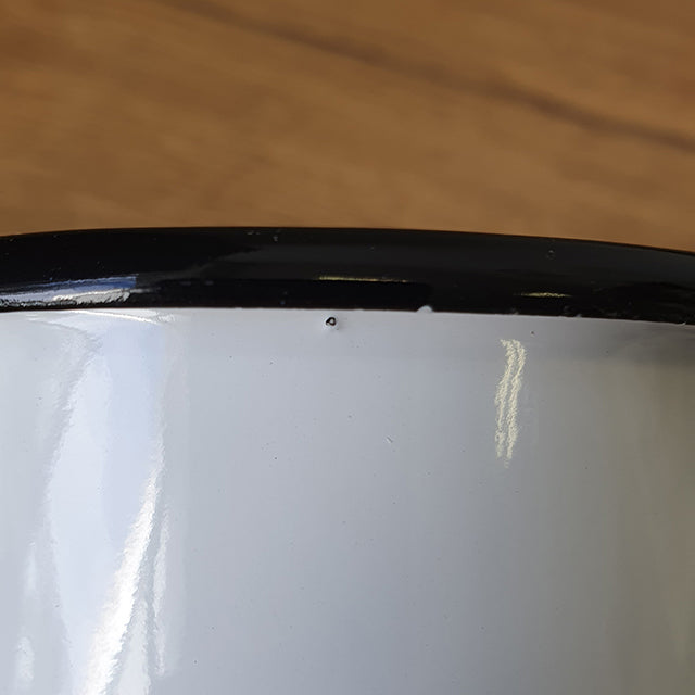 damaged enamel mug