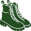 Green boots with a leaf design on a white background