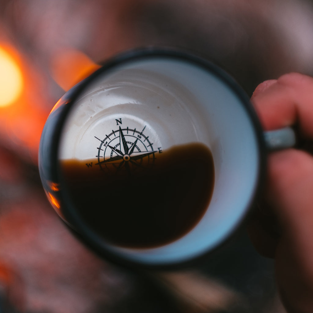 custom printed enamel mug with inside compass print