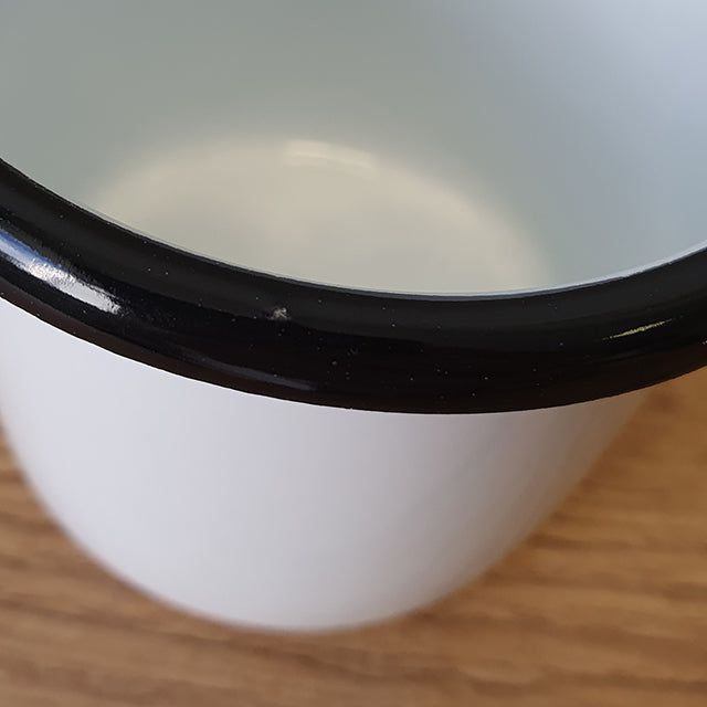 damaged enamel mug