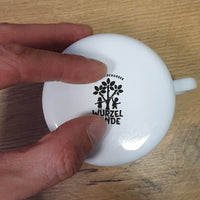 hand applied ceramic decol on enamel mug