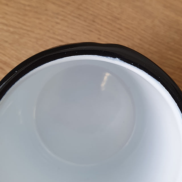 damaged enamel mug